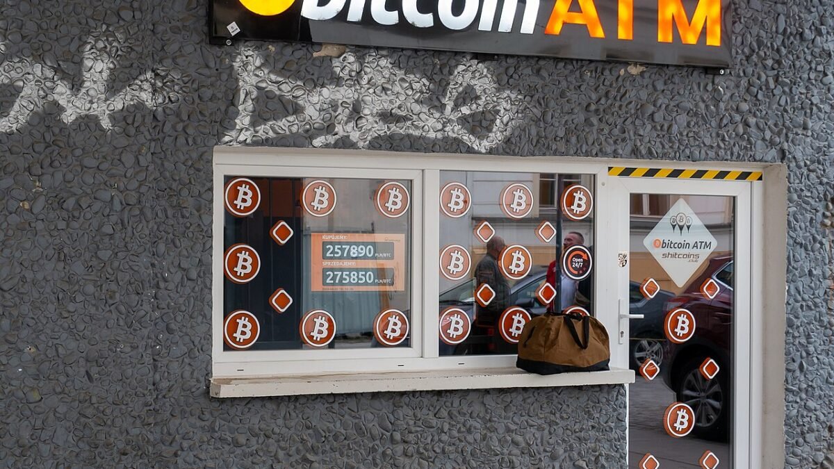 A Bitcoin ATM store sign in Wrocław, Poland