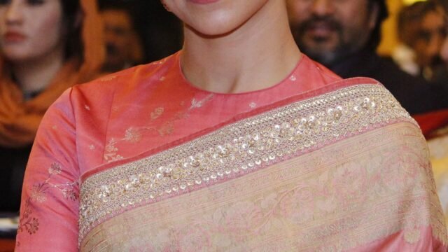 Deepika Padukone smiling at a public event
