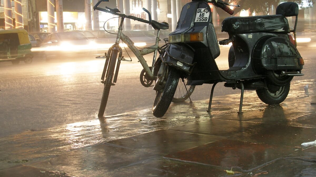 A rain-soaked Delhi street at night