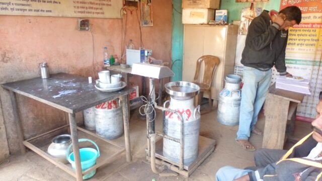 Farmers at a village milk collection centre in Kolhapur district