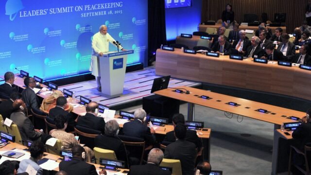 Prime Minister Narendra Modi speaking at a podium