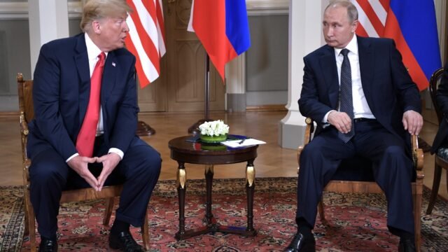 Vladimir Putin and Donald Trump at their meeting in Helsinki in 2018