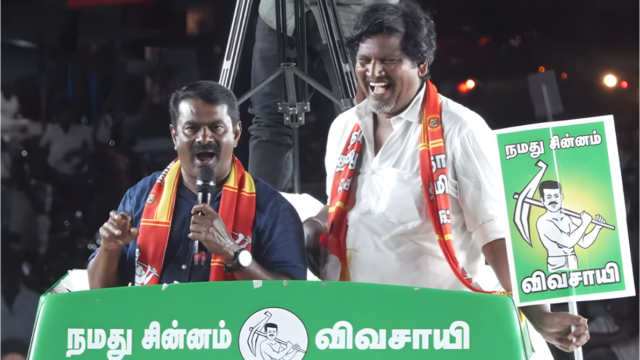 NTK chief Seeman (left) campaigning at a road rally