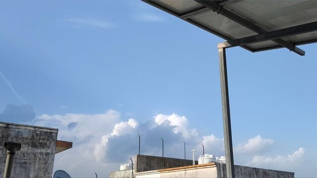 Solar Panel Canopy under a Blue Sky